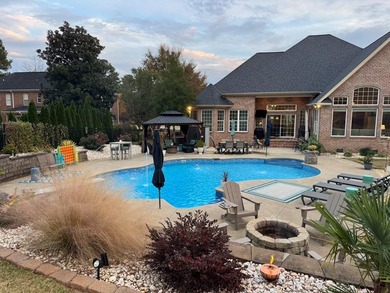 Stunning Brick Estate Home Meets Everyday Comfort. Welcome to on Hunters Creek Golf and Country Club  in South Carolina - for sale on GolfHomes.com, golf home, golf lot