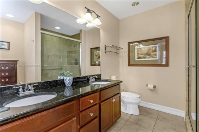 This impeccable two bedroom, two bathroom apartment offers a on Carrollwood Country Club in Florida - for sale on GolfHomes.com, golf home, golf lot