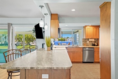 Experience the perfect blend of coastal charm and modern comfort on Gulf Harbors Golf Course in Florida - for sale on GolfHomes.com, golf home, golf lot