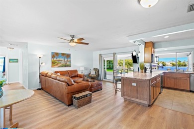Experience the perfect blend of coastal charm and modern comfort on Gulf Harbors Golf Course in Florida - for sale on GolfHomes.com, golf home, golf lot