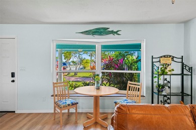 Experience the perfect blend of coastal charm and modern comfort on Gulf Harbors Golf Course in Florida - for sale on GolfHomes.com, golf home, golf lot