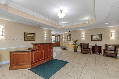 This impeccable two bedroom, two bathroom apartment offers a on Carrollwood Country Club in Florida - for sale on GolfHomes.com, golf home, golf lot