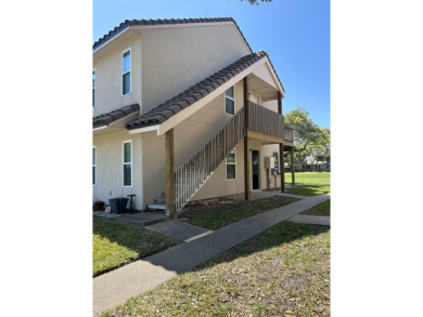 Highly sought after ground floor corner end unit overlooking the on Rockport Country Club in Texas - for sale on GolfHomes.com, golf home, golf lot