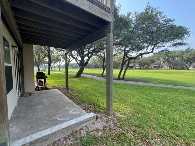 Highly sought after ground floor corner end unit overlooking the on Rockport Country Club in Texas - for sale on GolfHomes.com, golf home, golf lot