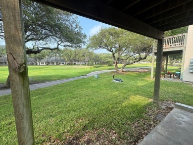 Highly sought after ground floor corner end unit overlooking the on Rockport Country Club in Texas - for sale on GolfHomes.com, golf home, golf lot