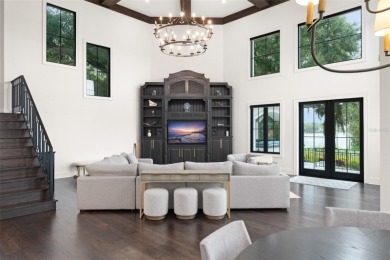 Presenting a magnificent Isleworth golf front estate with on Isleworth Golf and Country Club in Florida - for sale on GolfHomes.com, golf home, golf lot