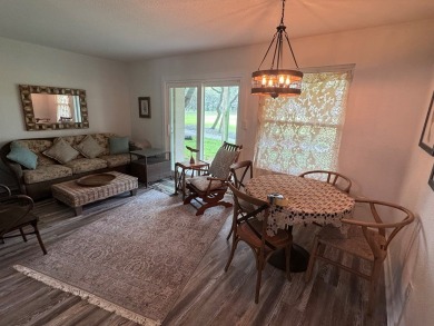 Highly sought after ground floor corner end unit overlooking the on Rockport Country Club in Texas - for sale on GolfHomes.com, golf home, golf lot