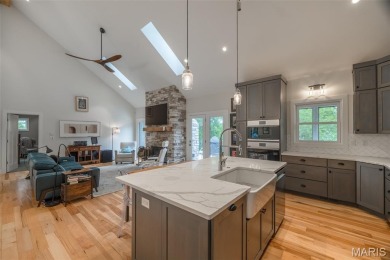 Less than 2 years old, this expanded custom cottage floorplan on Innsbrook Resort Golf Course in Missouri - for sale on GolfHomes.com, golf home, golf lot