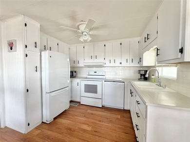 Welcome to this charming and beautifully maintained home on Fairway Village Golf Course in Florida - for sale on GolfHomes.com, golf home, golf lot