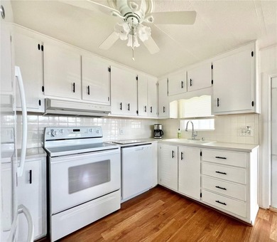 Welcome to this charming and beautifully maintained home on Fairway Village Golf Course in Florida - for sale on GolfHomes.com, golf home, golf lot