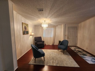 Welcome to this lovely 3BR/2BA located in the 55+ active adult on Spanish Lakes Fairways in Florida - for sale on GolfHomes.com, golf home, golf lot