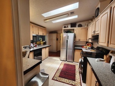 Welcome to this lovely 3BR/2BA located in the 55+ active adult on Spanish Lakes Fairways in Florida - for sale on GolfHomes.com, golf home, golf lot