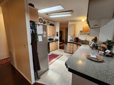 Welcome to this lovely 3BR/2BA located in the 55+ active adult on Spanish Lakes Fairways in Florida - for sale on GolfHomes.com, golf home, golf lot