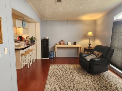 Welcome to this lovely 3BR/2BA located in the 55+ active adult on Spanish Lakes Fairways in Florida - for sale on GolfHomes.com, golf home, golf lot