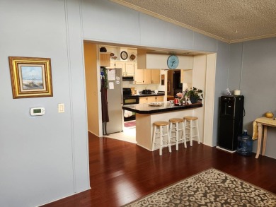 Welcome to this lovely 3BR/2BA located in the 55+ active adult on Spanish Lakes Fairways in Florida - for sale on GolfHomes.com, golf home, golf lot