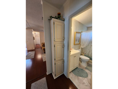 Welcome to this lovely 3BR/2BA located in the 55+ active adult on Spanish Lakes Fairways in Florida - for sale on GolfHomes.com, golf home, golf lot