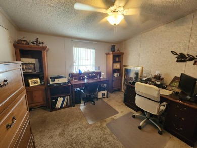 Welcome to this lovely 3BR/2BA located in the 55+ active adult on Spanish Lakes Fairways in Florida - for sale on GolfHomes.com, golf home, golf lot