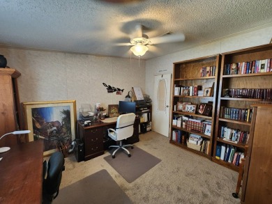 Welcome to this lovely 3BR/2BA located in the 55+ active adult on Spanish Lakes Fairways in Florida - for sale on GolfHomes.com, golf home, golf lot