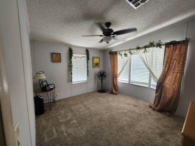 Welcome to this lovely 3BR/2BA located in the 55+ active adult on Spanish Lakes Fairways in Florida - for sale on GolfHomes.com, golf home, golf lot