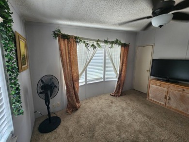 Welcome to this lovely 3BR/2BA located in the 55+ active adult on Spanish Lakes Fairways in Florida - for sale on GolfHomes.com, golf home, golf lot
