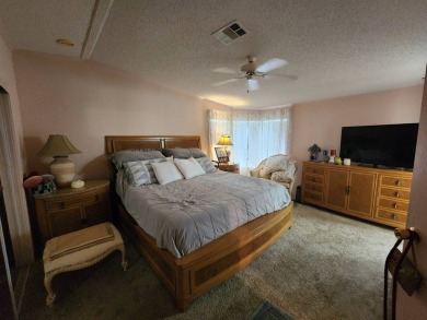 Welcome to this lovely 3BR/2BA located in the 55+ active adult on Spanish Lakes Fairways in Florida - for sale on GolfHomes.com, golf home, golf lot