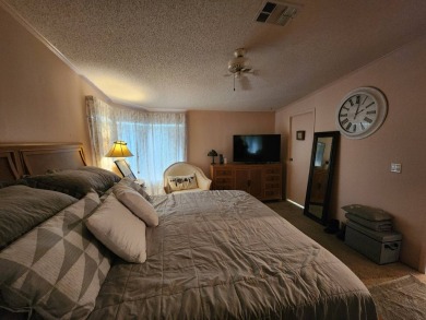 Welcome to this lovely 3BR/2BA located in the 55+ active adult on Spanish Lakes Fairways in Florida - for sale on GolfHomes.com, golf home, golf lot