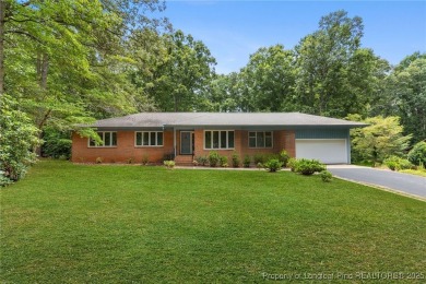 Welcome to a beautifully, partially updated brick home nestled on Carolina Trace Country Club in North Carolina - for sale on GolfHomes.com, golf home, golf lot