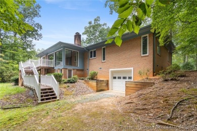 Welcome to a beautifully, partially updated brick home nestled on Carolina Trace Country Club in North Carolina - for sale on GolfHomes.com, golf home, golf lot