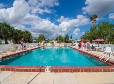 Welcome to this lovely 3BR/2BA located in the 55+ active adult on Spanish Lakes Fairways in Florida - for sale on GolfHomes.com, golf home, golf lot