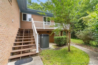 Welcome to a beautifully, partially updated brick home nestled on Carolina Trace Country Club in North Carolina - for sale on GolfHomes.com, golf home, golf lot