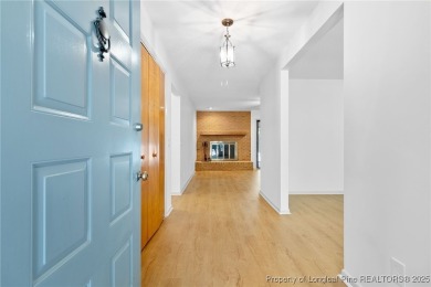 Welcome to a beautifully, partially updated brick home nestled on Carolina Trace Country Club in North Carolina - for sale on GolfHomes.com, golf home, golf lot