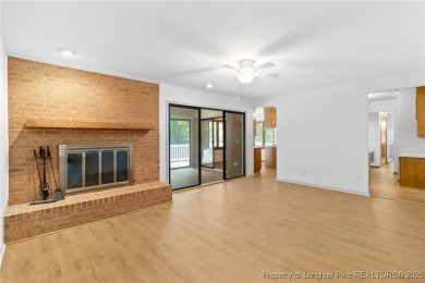 Welcome to a beautifully, partially updated brick home nestled on Carolina Trace Country Club in North Carolina - for sale on GolfHomes.com, golf home, golf lot