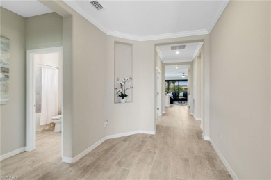 Discover luxury living in this modern and bright single-family on Old Corkscrew Golf Club in Florida - for sale on GolfHomes.com, golf home, golf lot