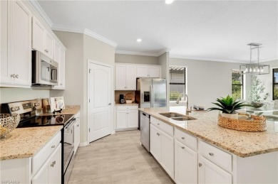 Discover luxury living in this modern and bright single-family on Old Corkscrew Golf Club in Florida - for sale on GolfHomes.com, golf home, golf lot