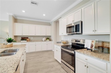 Discover luxury living in this modern and bright single-family on Old Corkscrew Golf Club in Florida - for sale on GolfHomes.com, golf home, golf lot
