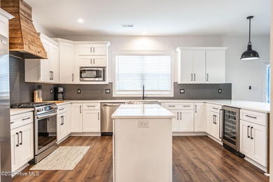 Golf course front living at its finest, perfectly positioned on on Deercroft Golf and Country Club in North Carolina - for sale on GolfHomes.com, golf home, golf lot