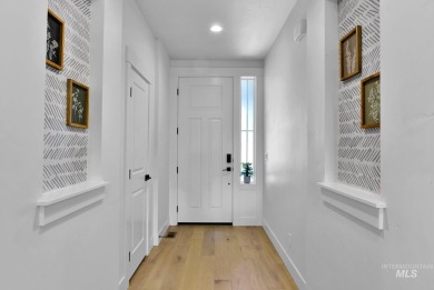 Step into refined elegance with this stunning residence in on Hunters Point Golf Club in Idaho - for sale on GolfHomes.com, golf home, golf lot