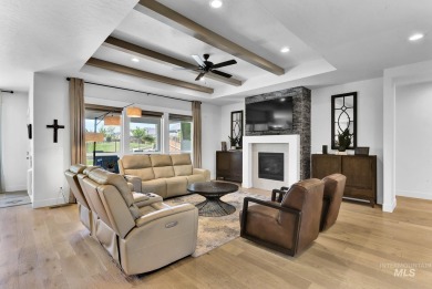 Step into refined elegance with this stunning residence in on Hunters Point Golf Club in Idaho - for sale on GolfHomes.com, golf home, golf lot