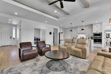 Step into refined elegance with this stunning residence in on Hunters Point Golf Club in Idaho - for sale on GolfHomes.com, golf home, golf lot