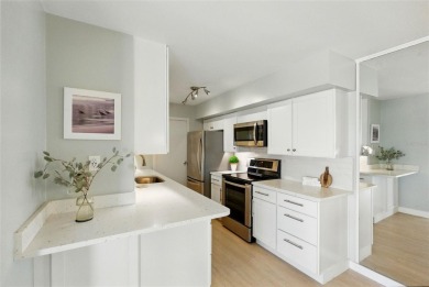 Welcome to LIVING LARGE in PARADISE!! This beautiful CORNER UNIT on Treasure Bay Golf and Tennis in Florida - for sale on GolfHomes.com, golf home, golf lot