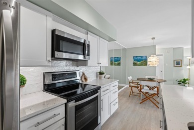 Welcome to LIVING LARGE in PARADISE!! This beautiful CORNER UNIT on Treasure Bay Golf and Tennis in Florida - for sale on GolfHomes.com, golf home, golf lot