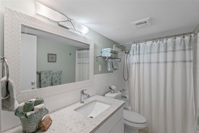 Welcome to LIVING LARGE in PARADISE!! This beautiful CORNER UNIT on Treasure Bay Golf and Tennis in Florida - for sale on GolfHomes.com, golf home, golf lot