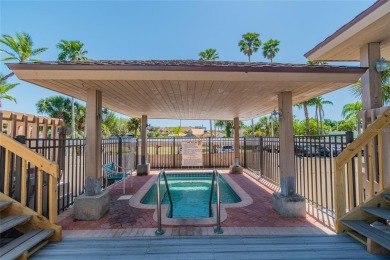 Welcome to LIVING LARGE in PARADISE!! This beautiful CORNER UNIT on Treasure Bay Golf and Tennis in Florida - for sale on GolfHomes.com, golf home, golf lot