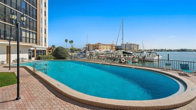 Welcome to LIVING LARGE in PARADISE!! This beautiful CORNER UNIT on Treasure Bay Golf and Tennis in Florida - for sale on GolfHomes.com, golf home, golf lot