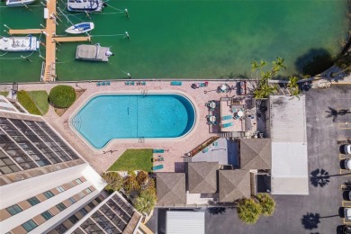Welcome to LIVING LARGE in PARADISE!! This beautiful CORNER UNIT on Treasure Bay Golf and Tennis in Florida - for sale on GolfHomes.com, golf home, golf lot