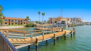 Welcome to LIVING LARGE in PARADISE!! This beautiful CORNER UNIT on Treasure Bay Golf and Tennis in Florida - for sale on GolfHomes.com, golf home, golf lot