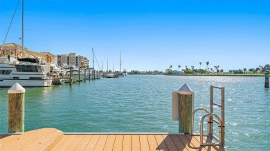 Welcome to LIVING LARGE in PARADISE!! This beautiful CORNER UNIT on Treasure Bay Golf and Tennis in Florida - for sale on GolfHomes.com, golf home, golf lot