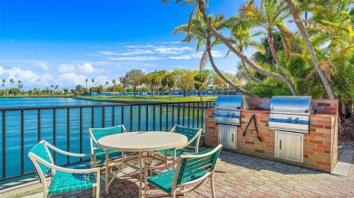 Welcome to LIVING LARGE in PARADISE!! This beautiful CORNER UNIT on Treasure Bay Golf and Tennis in Florida - for sale on GolfHomes.com, golf home, golf lot