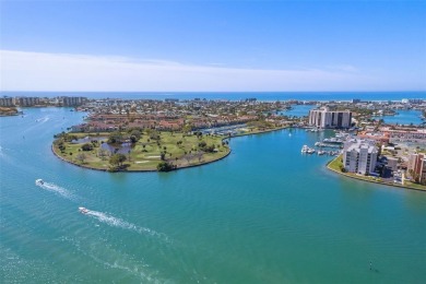 Welcome to LIVING LARGE in PARADISE!! This beautiful CORNER UNIT on Treasure Bay Golf and Tennis in Florida - for sale on GolfHomes.com, golf home, golf lot