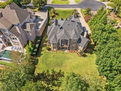 Elegant Brick & Stone Estate on a Private Cul-de-Sac with on St. Marlo Country Club in Georgia - for sale on GolfHomes.com, golf home, golf lot
